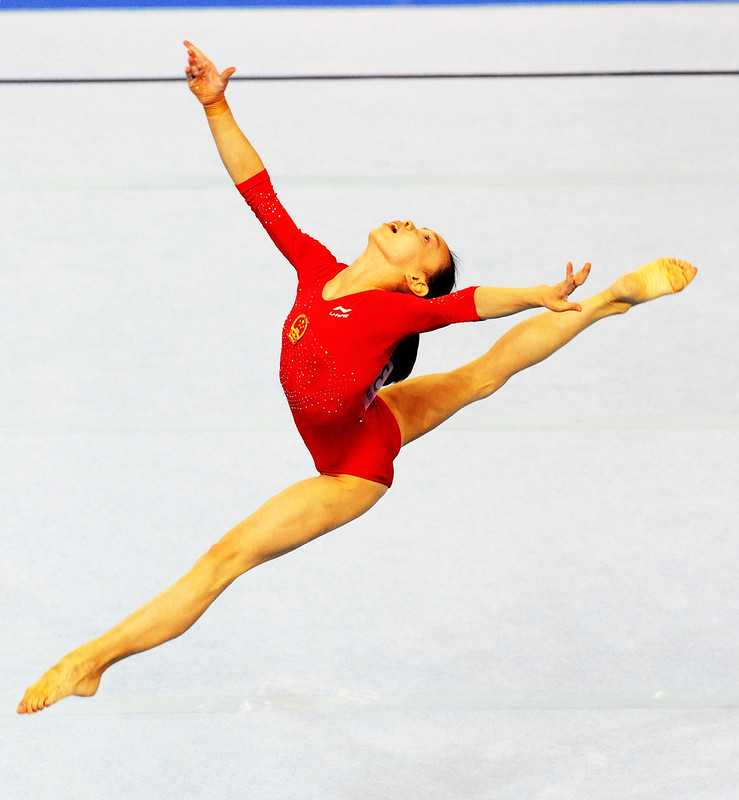 gymnast in mid-routine