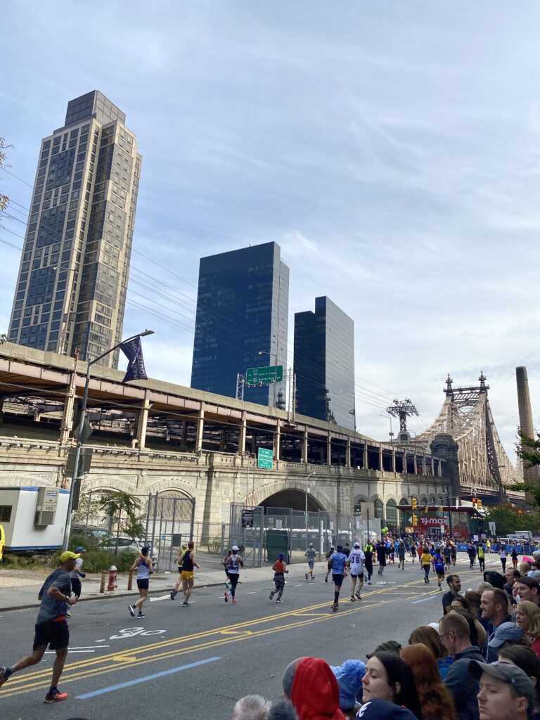 runners coming off the 59th Street Bridge, about to make the turn onto 1st Avenue during the 2021 New York City Marathon