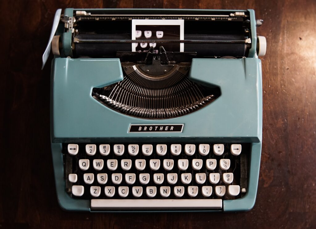 That's a photo of a Brother typewriter, in teal and black.
