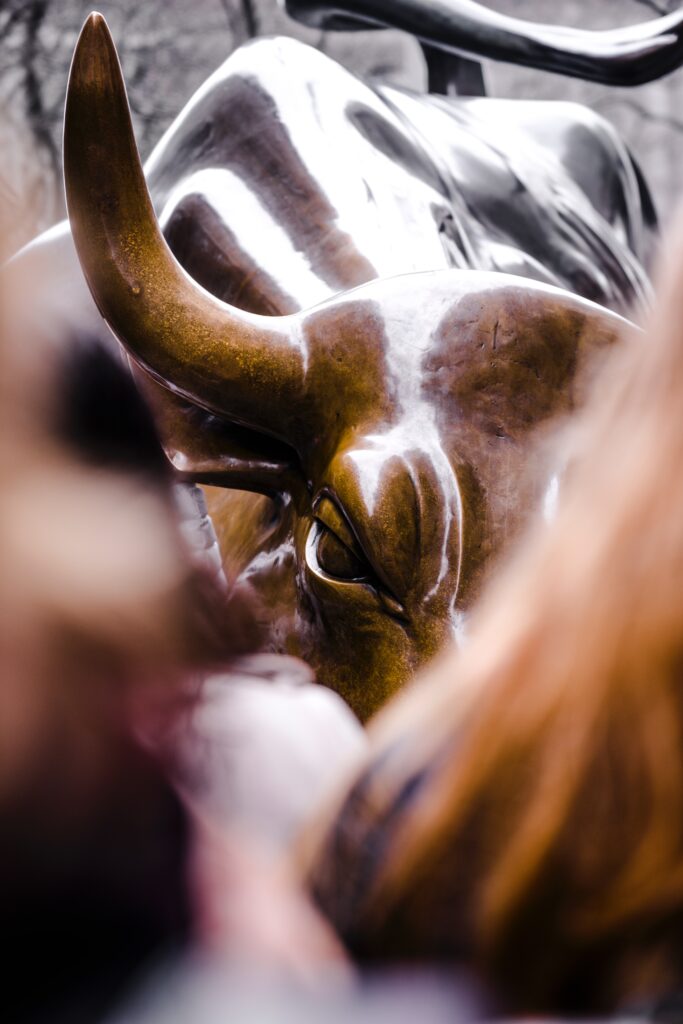 A bronze bull sculpture stands proudly on Wall Street, representing the resilience and power of the financial markets. This iconic symbol serves as a reminder of the bullish optimism that drives the world of finance.