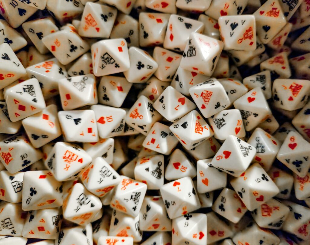 A pile of white, multi-sided dice.